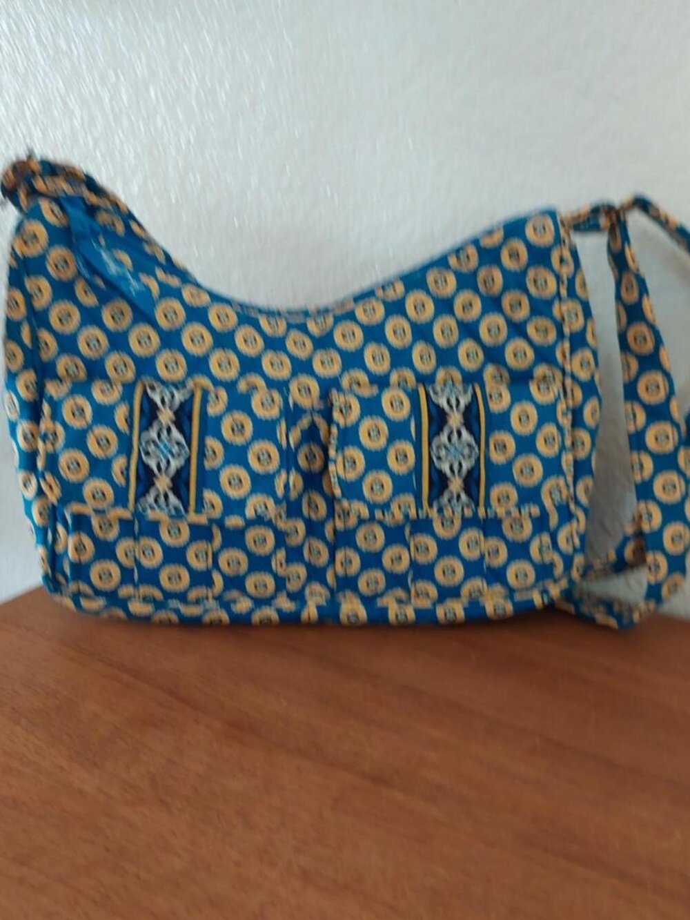 vera bradley rivera Blue and yellow circular patterned crossbody bag with adjust
